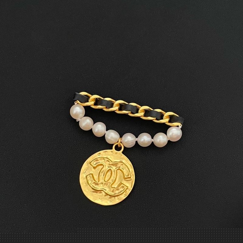 Ch*el brooches